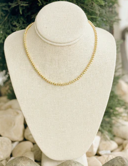 Gold ball necklace
