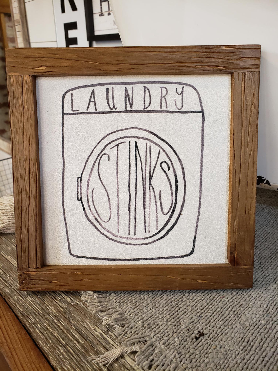 Laundry Stinks Sign
